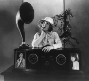 3a35553u Clara Horton tuned in on a concert with her receiver, 1925